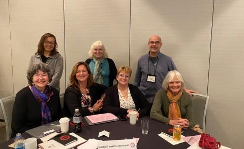 Faculty present on interprofessional education at a summit in Chicago