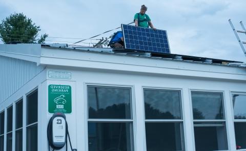 ReVision employees installed a total of 12 solar panels on the roof of the Bishop Street bus shelter. The energy generated will 